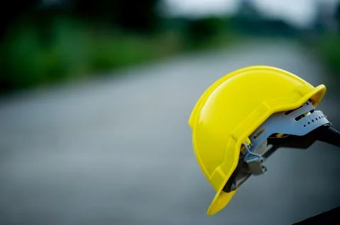 Engineering caps placed on paper. The concept of engineering. With copy space 库存照片