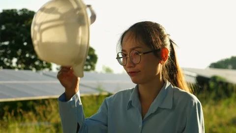 Engineering checking Solar cell Farm, standing near sun panels. Stock Footage 119074097