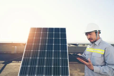 Engineering checking solar panel power system clean energy Stock Photos