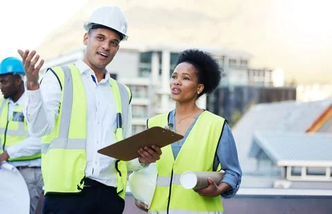Engineering, clipboard and construction workers planning project in Stock Photos
