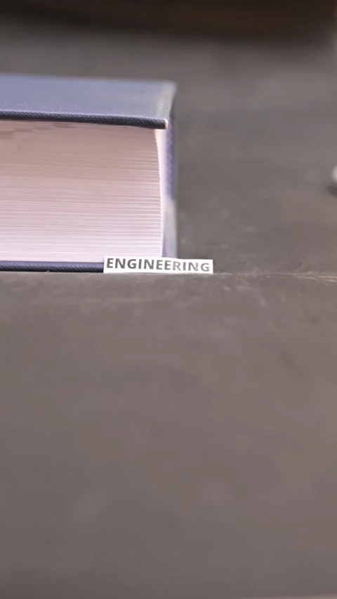 Engineering Concept on White Paper Symbolizing Innovation and Technical Stock Footage 338238293