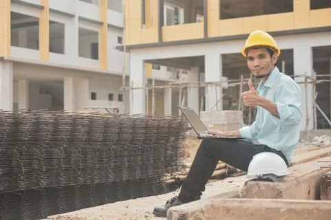 Engineering construction holding computer notebook inspection work at estate  Stock-Fotos