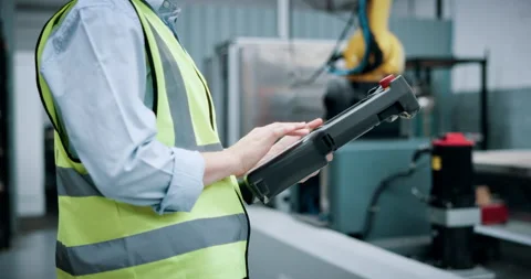 Engineering, controller and robotics with hands in workshop for industrial Stock Footage 331627350