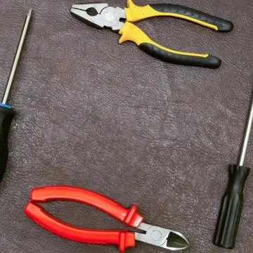 Engineering design base steam pliers red black screwdriver frame Foto stock