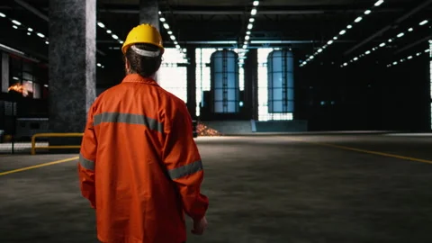 Engineering expert, heavy machinery inspection, large-scale warehouse Stock Footage 330089644
