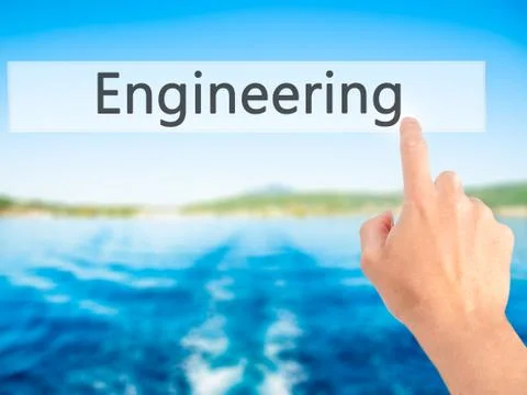 Engineering - Hand pressing a button on blurred background concept on visual  Foto stock