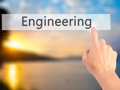 Engineering - Hand pressing a button on blurred background concept on visual  Foto stock