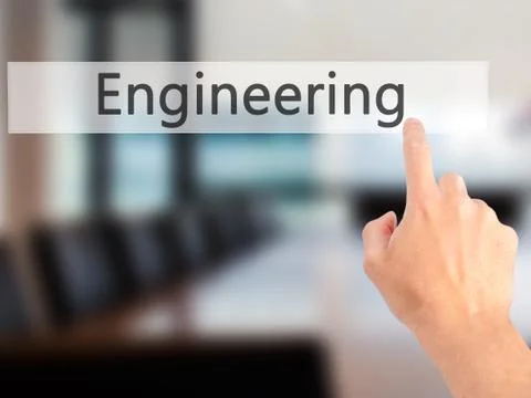 Engineering - Hand pressing a button on blurred background concept on visual  Foto stock
