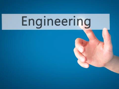 Engineering - Hand pressing a button on blurred background concept on visual  Foto stock