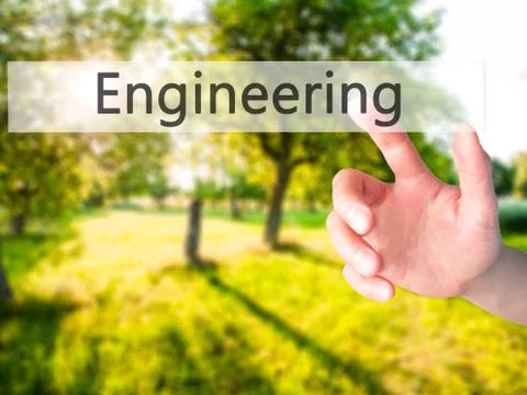 Engineering - Hand pressing a button on blurred background concept on visual  Foto stock