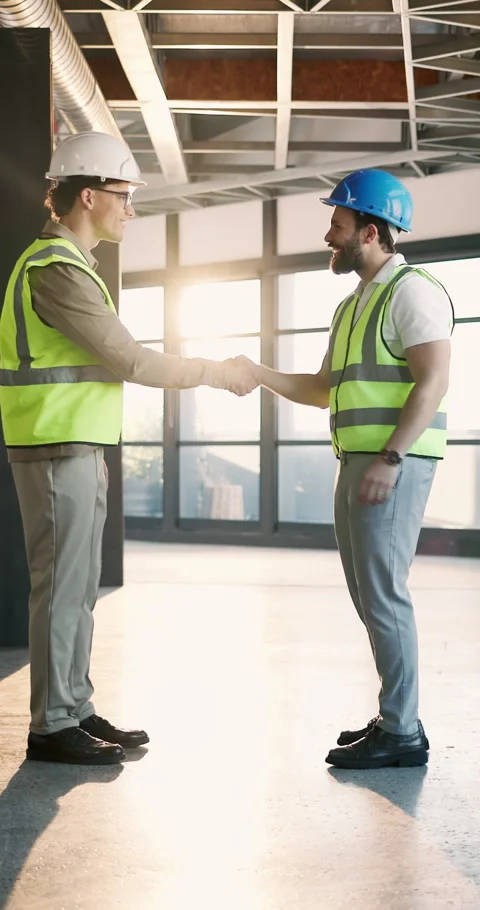 Engineering, handshake and smile with people in office for architect contract Stock Footage 340780533
