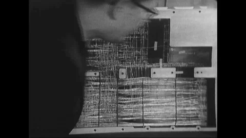 Engineering manager explains the complexity of wire in AGC - 1965 Video stock 104333919