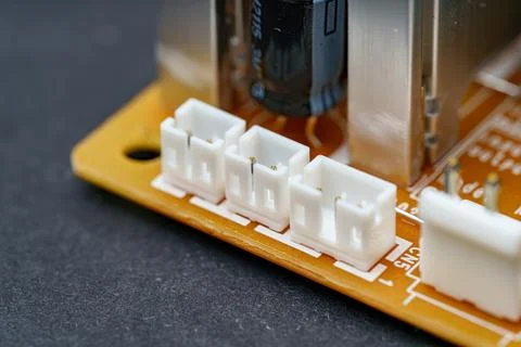 Engineering marvel closeup features three connectors on a printed circuit boa Stock Photos