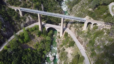 Engineering Marvels Spanning the Spectacular Vecchio River in Corsica Stock Footage 253583566