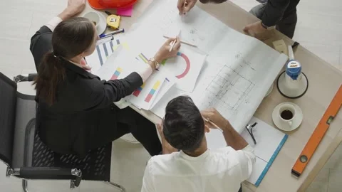 Engineering or architect team brainstrom working and discussing project plan Stock Footage 139797834