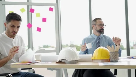 Engineering or architect team brainstrom working and discussing project plan Stock Footage 139797960