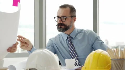 Engineering or architect team brainstrom working and discussing project plan Stock Footage 139798027