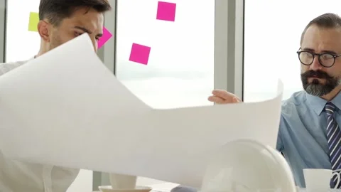Engineering or architect team brainstrom working and discussing project plan Stock Footage 139798037