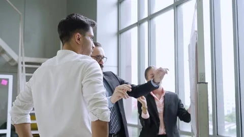 Engineering or businesspeople brainstorming Stock Footage 140437285