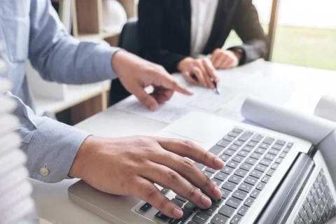 Engineering or Creative architect in construction project, Engineers hands wo Stock Photos