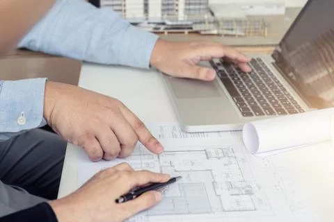 Engineering or Creative architect in construction project, Engineers hands wo Stock Photos