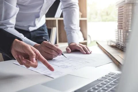 Engineering or Creative architect in construction project, Engineers hands .. Stock Photos