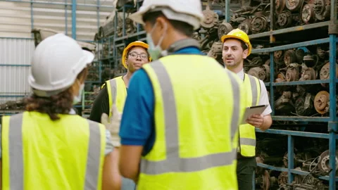 Engineering people are working in  heavy industrial plant Engine parts factor Video stock 151546350