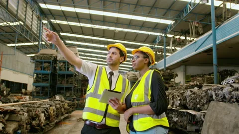 Engineering people are working in  heavy industrial plant Engine parts factor Video stock 151546742