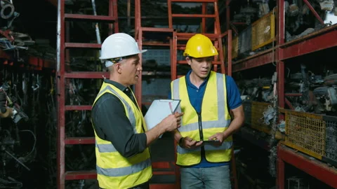 Engineering people are working in heavy industrial plant Engine parts factory Video stock 152829650