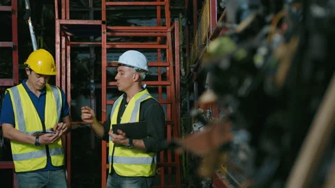 Engineering people are working in heavy industrial plant Engine parts factory Video stock 152829891