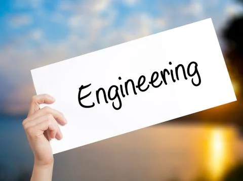 Engineering  Sign on white paper. Man Hand Holding Paper with text. Isolated  Foto stock