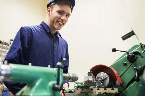 Engineering student using heavy machinery 写真素材