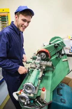 Engineering student using heavy machinery 写真素材