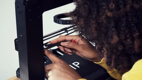 Engineering Student Works on 3D Printer, Repairing Technology Stock Footage 121347215