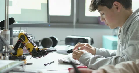 Engineering students printing prototypes in the lab Stock Footage 168337847