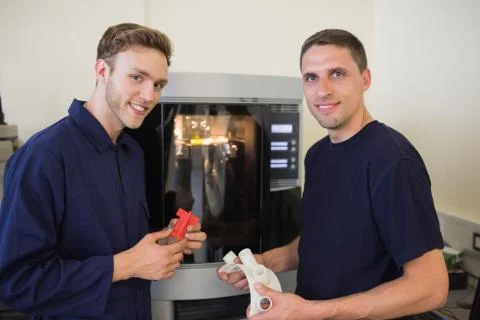 Engineering students using 3d printer Stock Photos