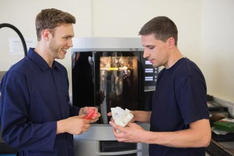 Engineering students using 3d printer Stock Photos