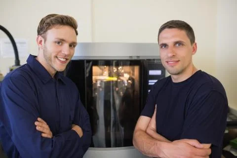 Engineering students using 3d printer Stock Photos