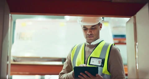 Engineering, tablet and man in a warehouse for inventory, stock check or parcel Stock Footage 249310902