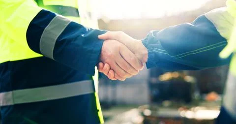 Engineering, team and handshake on construction site with deal, property Stock Photos