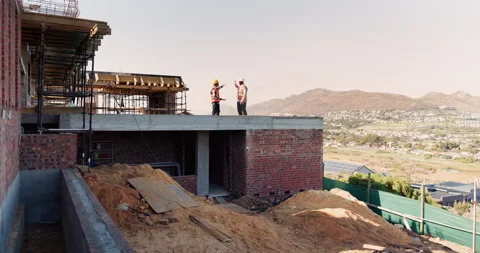 Engineering, team and high five at construction site with success, discussion or Stock Footage 336218644