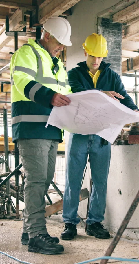 Engineering, team and meeting on construction site with blueprint, property Stock Footage 340874225