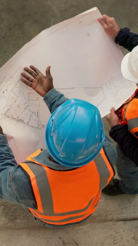 Engineering, team and talk with men with blueprint for architecture, project and Stock Footage 340889264