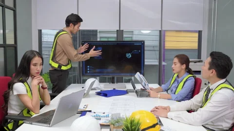 Engineering team is brainstorming to help plan a successful machine building. Stock Footage 140214074