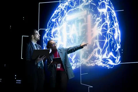 Engineering team collaborating to enforce AI agent guardrails 库存照片
