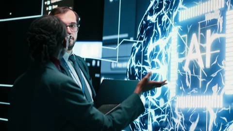 Engineering team coworkers receive tasks from autonomous agentic AI 스톡 동영상 329651504