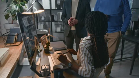 Engineering Team Discussing Solar Power System Project by Computer Stock Footage 307991804