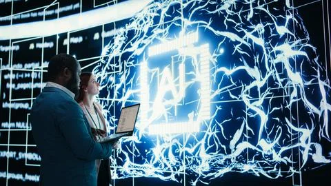 Engineering team reporting to AI brain automated manager, solving tasks together Stock Photos