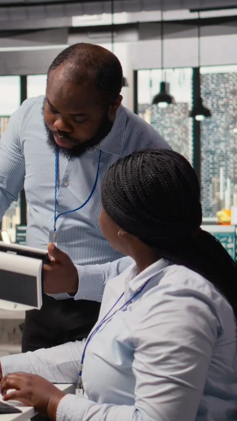 Engineering team turn on lights on portable solar energy gadget, testing battery Stock Footage 315475109