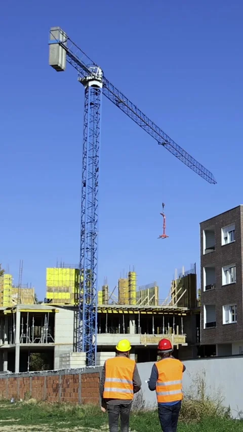 Engineering Team Walk at Construction Site and Discussing New Building Project Stock Footage 313036958